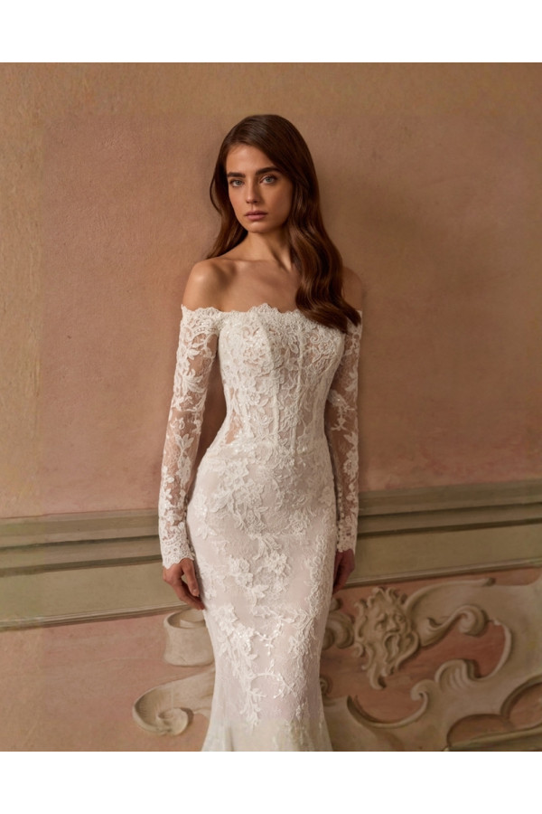 Ixora abito da sposa avorio in pizzo a sirena di Alberto Palatchi 2027